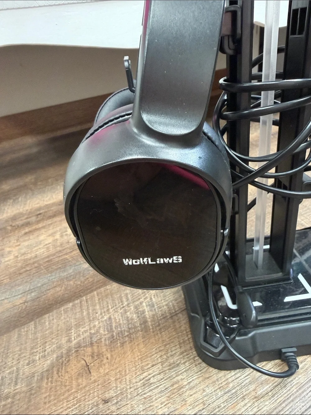 Black Over-Ear Headphones on Stand